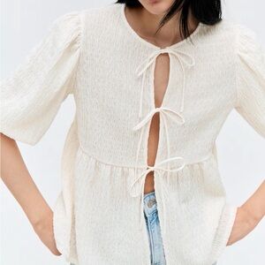 Elegant Cream Tie-Front Peplum Top